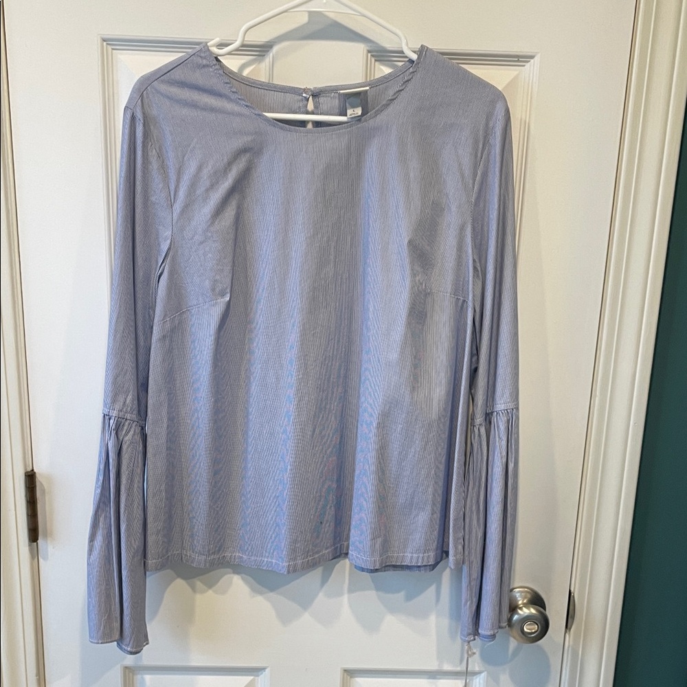 A New Day trumpet sleeve top